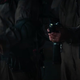 two headless torsos with proton packs